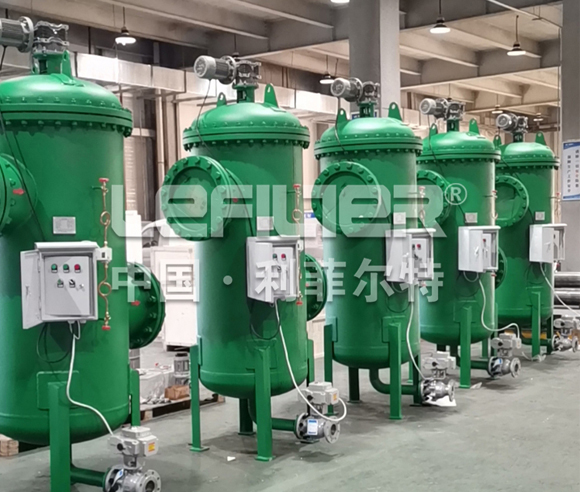 What role do self-cleaning filters play in the desalination process?